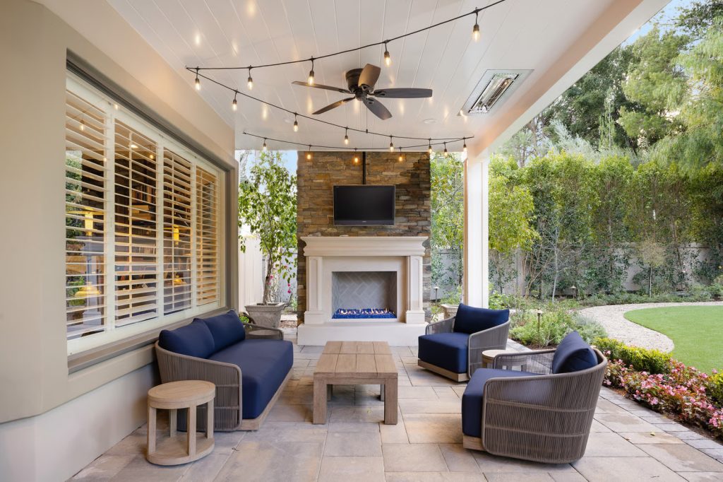Weather-resistant ceiling fan installed on a covered outdoor patio