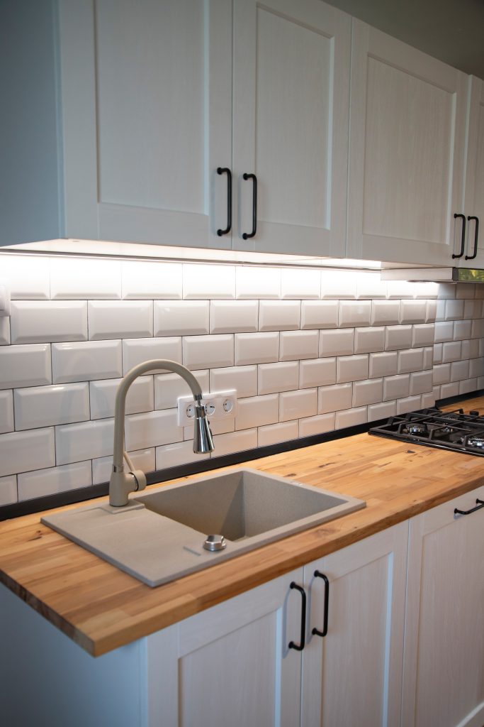 LED strip lighting installed under kitchen shelving in a Gold Coast home