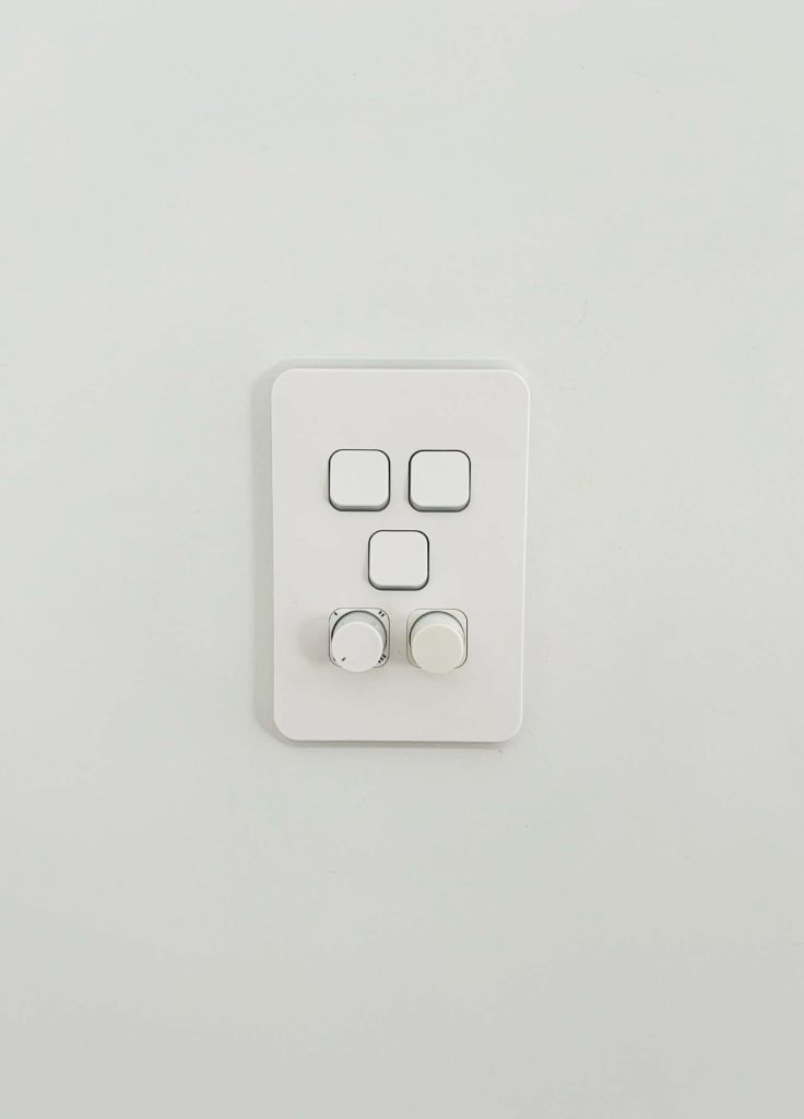 Modern light switch installed in a residential home