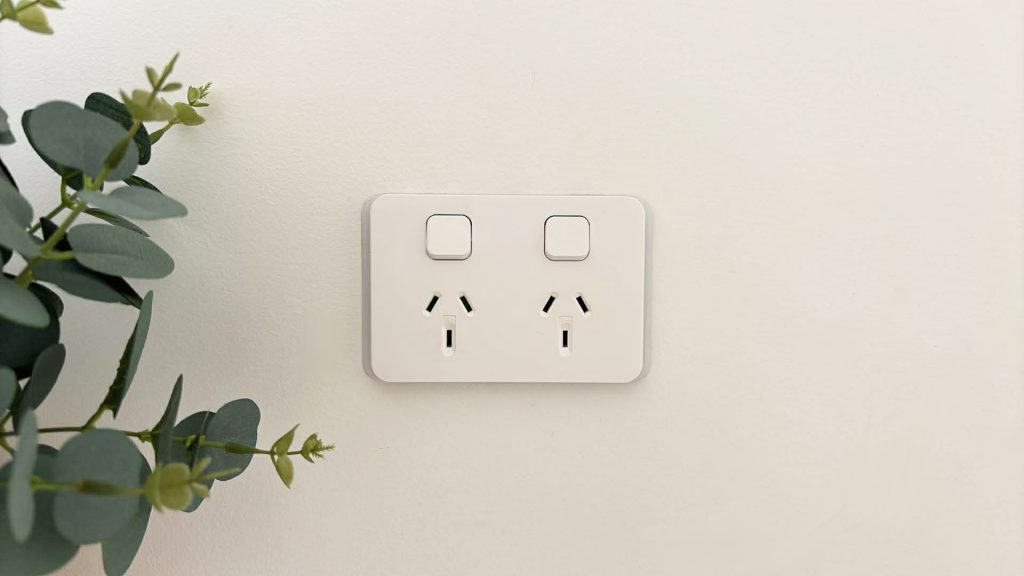 Standard double power point installed on an interior wall